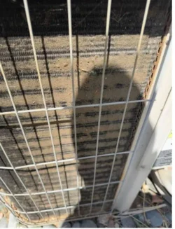 Clogged and dirty AC condenser coils restricting airflow