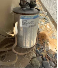 Air conditioner capacitor with label showing specifications