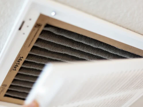 Closeup of dirty HVAC air filter ready for replacement